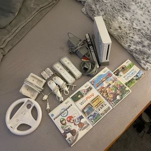 Nintendo Wii, 4 Nintendo Wii games, controllers, and more